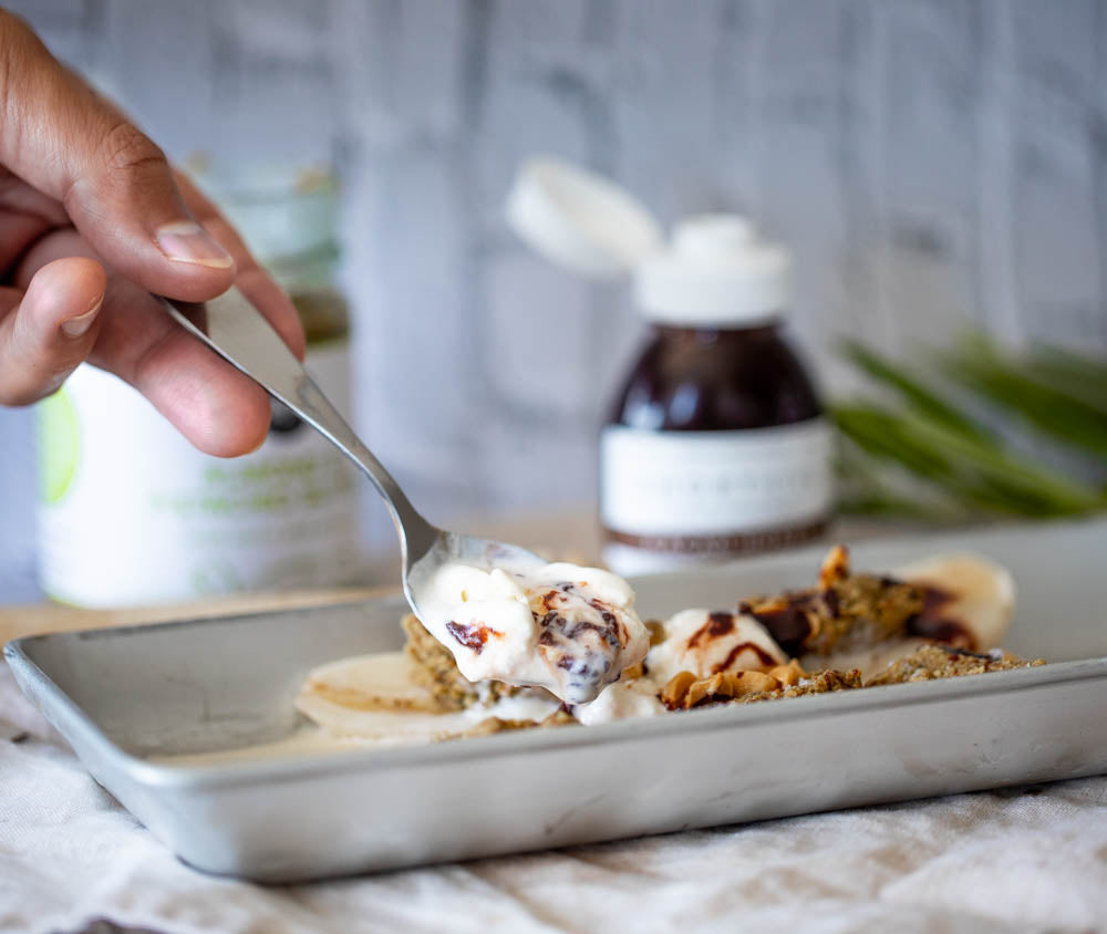 Image showing banana split with nut butter, icecream, ShortHive chocolate honey