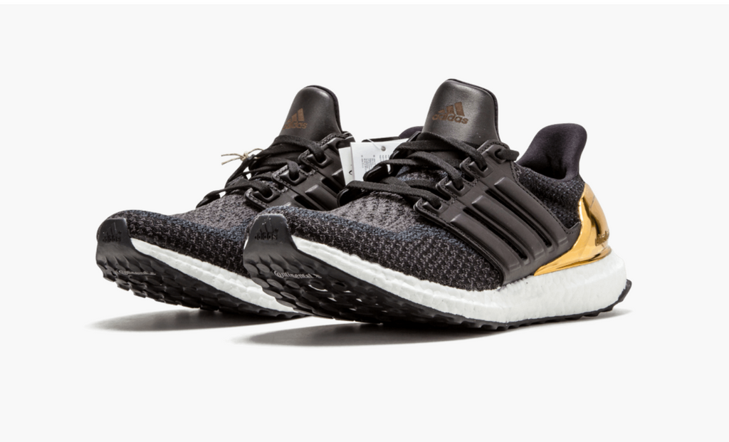 ultra boost black kurz gold foil