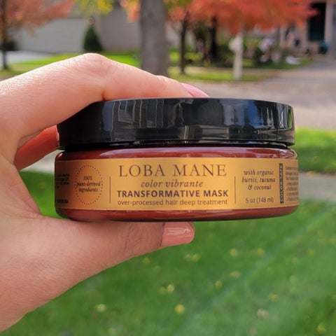 Loba Mane's Transformative Hair Mask being held outside during fall