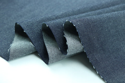 A cut of raw grey fabric