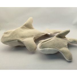 Two gray and white, cotton shark dog toys against a gray background. 