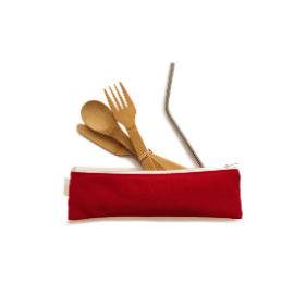 Red cotton zipper pouch with bamboo cutlery and stainless steel metal straw splayed out of the open part of the bag.