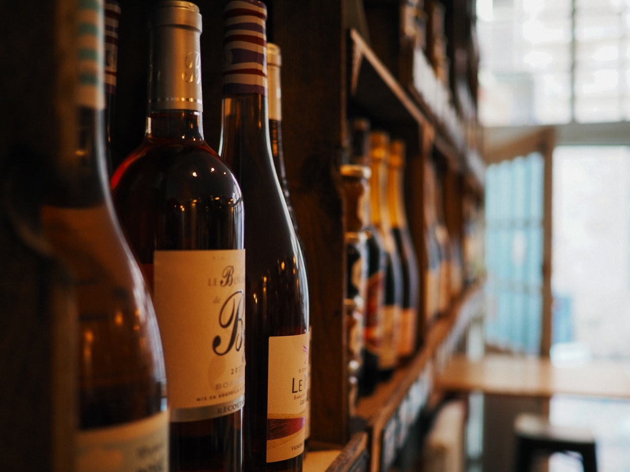 Wine bottles in a wine cellar with lighting