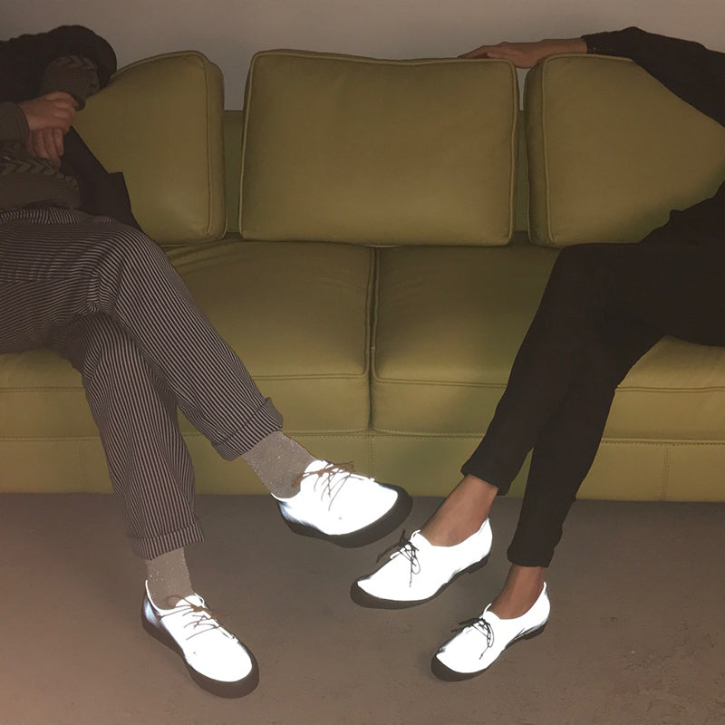 KARL reflective shoes featuring a black rubber sole designed by Tracey Neuls 