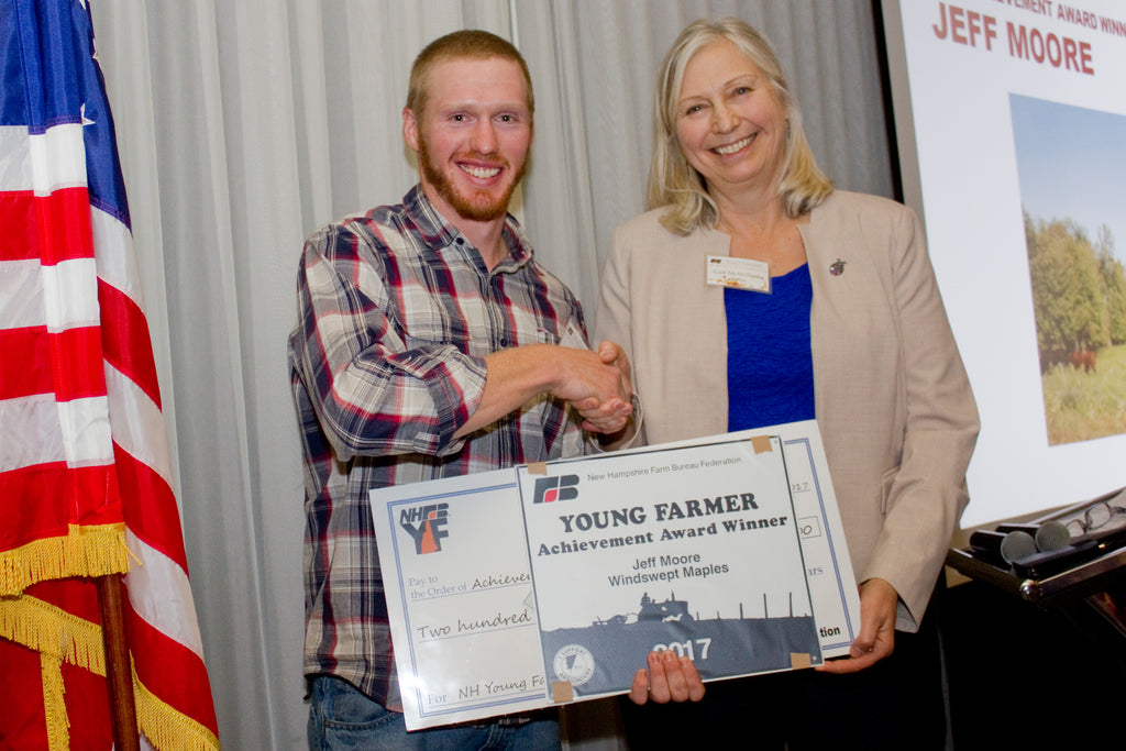 Jeff accepting the NH Young Farmer Achievement Award