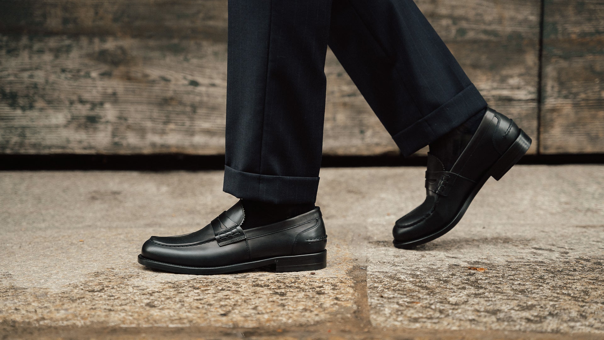 Men’s black leather slip on Penny Loafers | Velasca