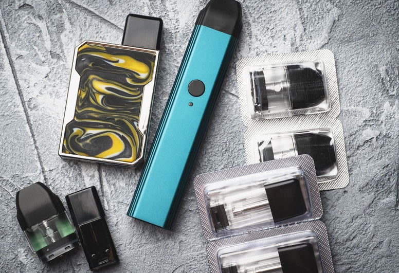 An assortment of various pod systems and vape pods.