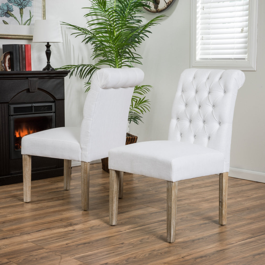 white tufted dining chairs