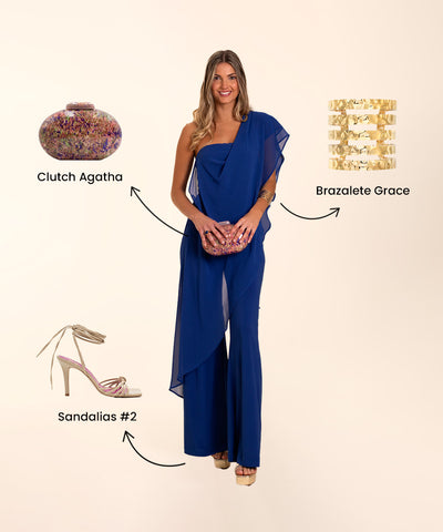 jumpsuit triana perfect for graduation, combined with strappy sandals and gold earrings.