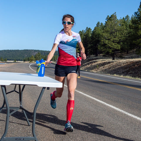 Half Marathon Training Plan for Beginners Steph Bruce water bottle aid station