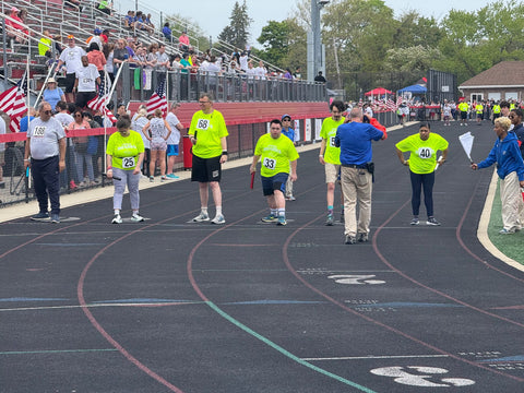 John and his teammates during the 4x100 relay at the 2025 Special Olympics Spring Games.