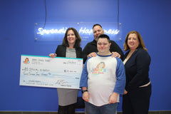John with Check for Special Olympics