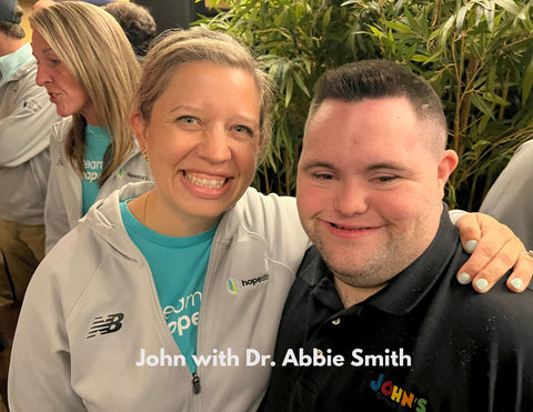 JOhn with Dr. Abbie Smith, Marathon Runner and Co-Founder of Hope Story