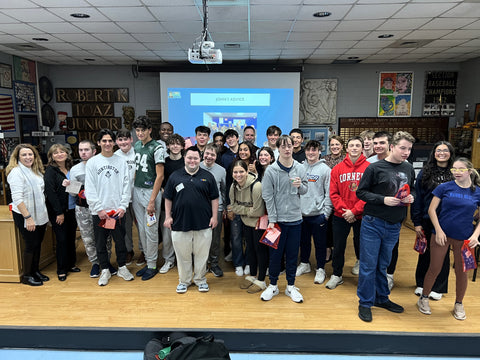 John with students at Huntington High School