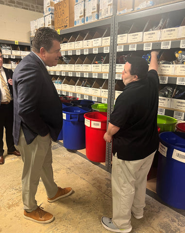 John shows Congressman LaLota his warehouse