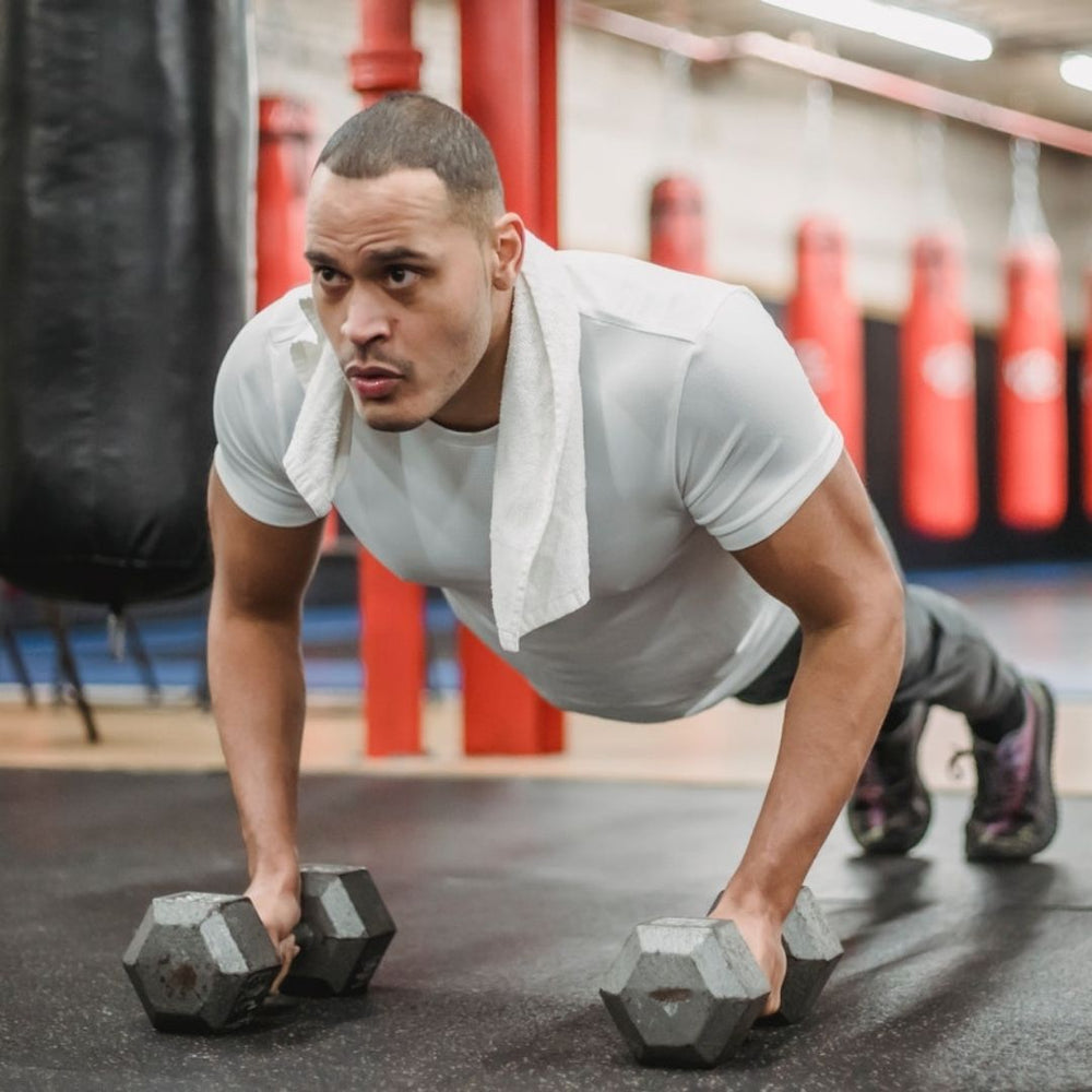 13 Best Dumbbell Chest Exercises Without A Bench - SET FOR SET