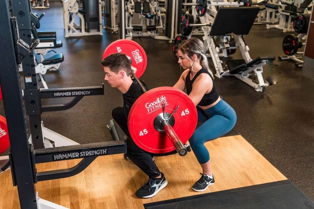 how to spot someone on back squat