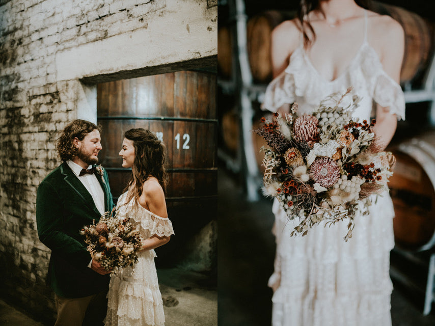 bride and groom holding dried flowers
