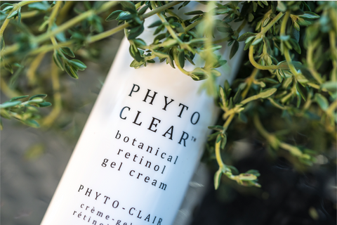 Bottle of Phyto Clear surrounded by greenery
