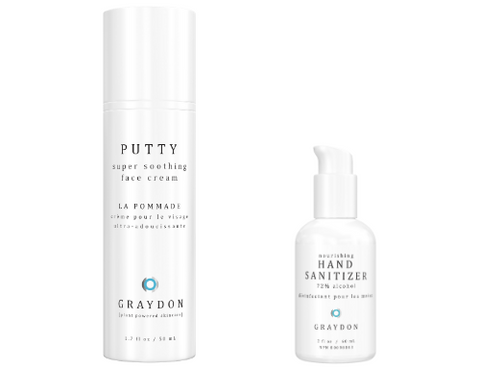 A moisturizer for irritated skin next to a nourishing hand sanitizer both of which are housed in white packaging