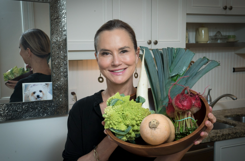 Graydon Moffat holding bowl of nutrient-rich vegetables