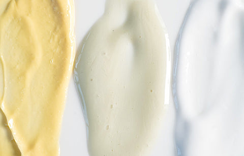 A yellow, light green and white coloured face cream smear by Graydon Skincare