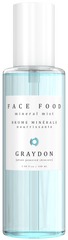 A bottle of aquamarine-coloured vegan hydrating face mist against a white background