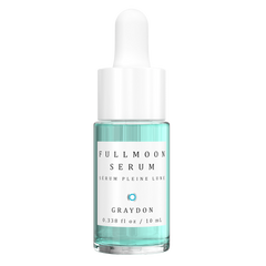 An aquamarine-coloured retinol alternative face serum housed in a glass bottle against a white background.