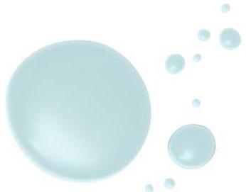 A smear of a deep blue, dry touch body oil against a white background