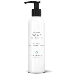 A bottle of liquid vegan soap for sensitive skin against a white background