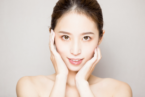 An asian woman with clear, healthy skin 