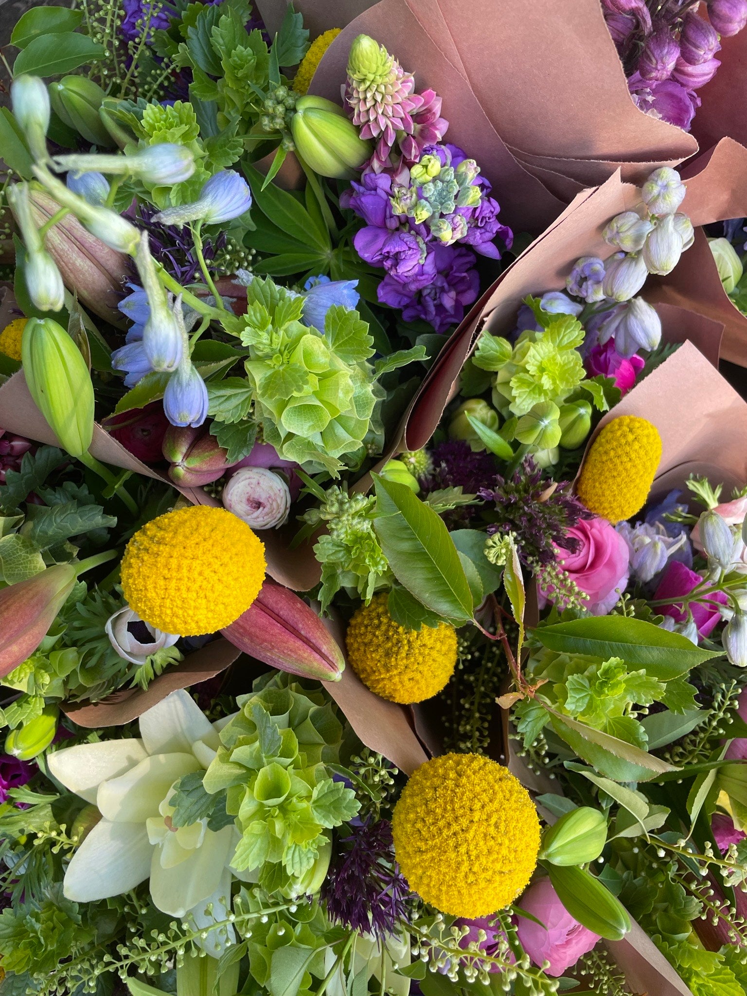 Bouquets with Craspedia by Moonshot Farm