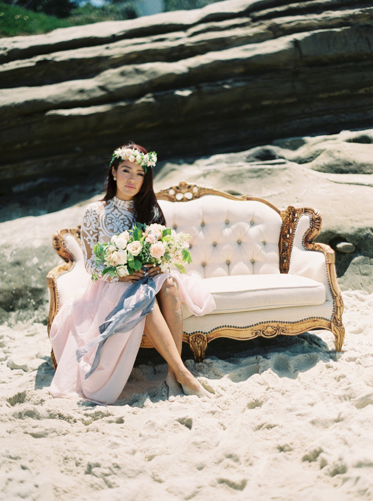 bride on couch at the beach