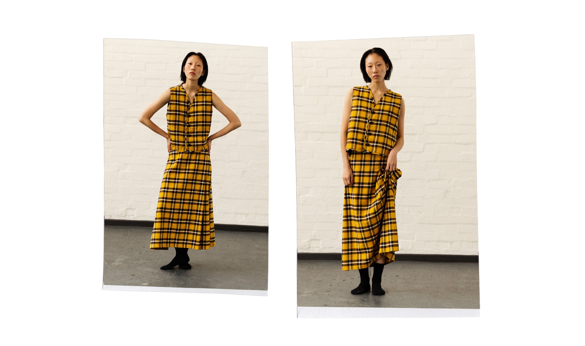 A.BCH Lookbook 2023 - Woman wears the A.25 Bolt Plaid Skirt in marigold + Red Line Reversible Quilt Vest in marigold and navy