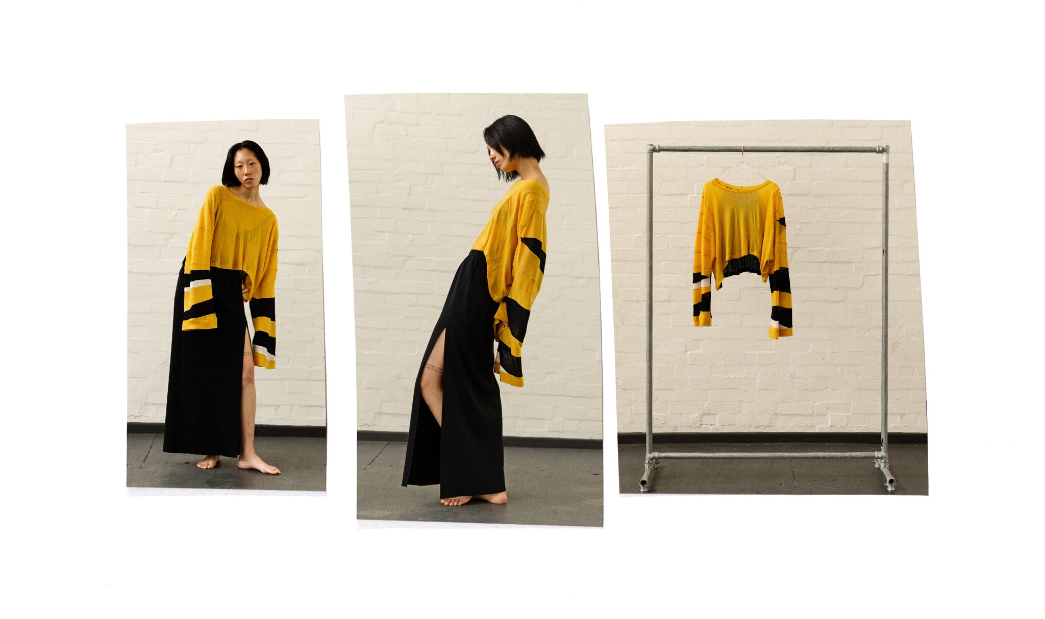 A.BCH Lookbook 2023 - Woman wears the Red Line Assyemtrical Cutpiece Top in marigold, black and ivory + A.41 Rib Split Skirt in black.