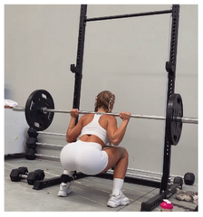 Tammy Hembrow Performing Barbell Back Squat