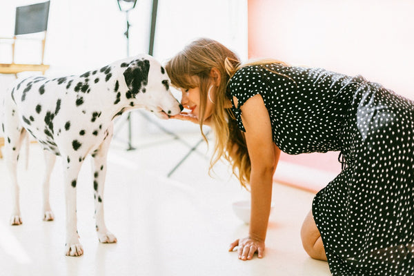 A woman and her Dalmatian are completely in love with each other