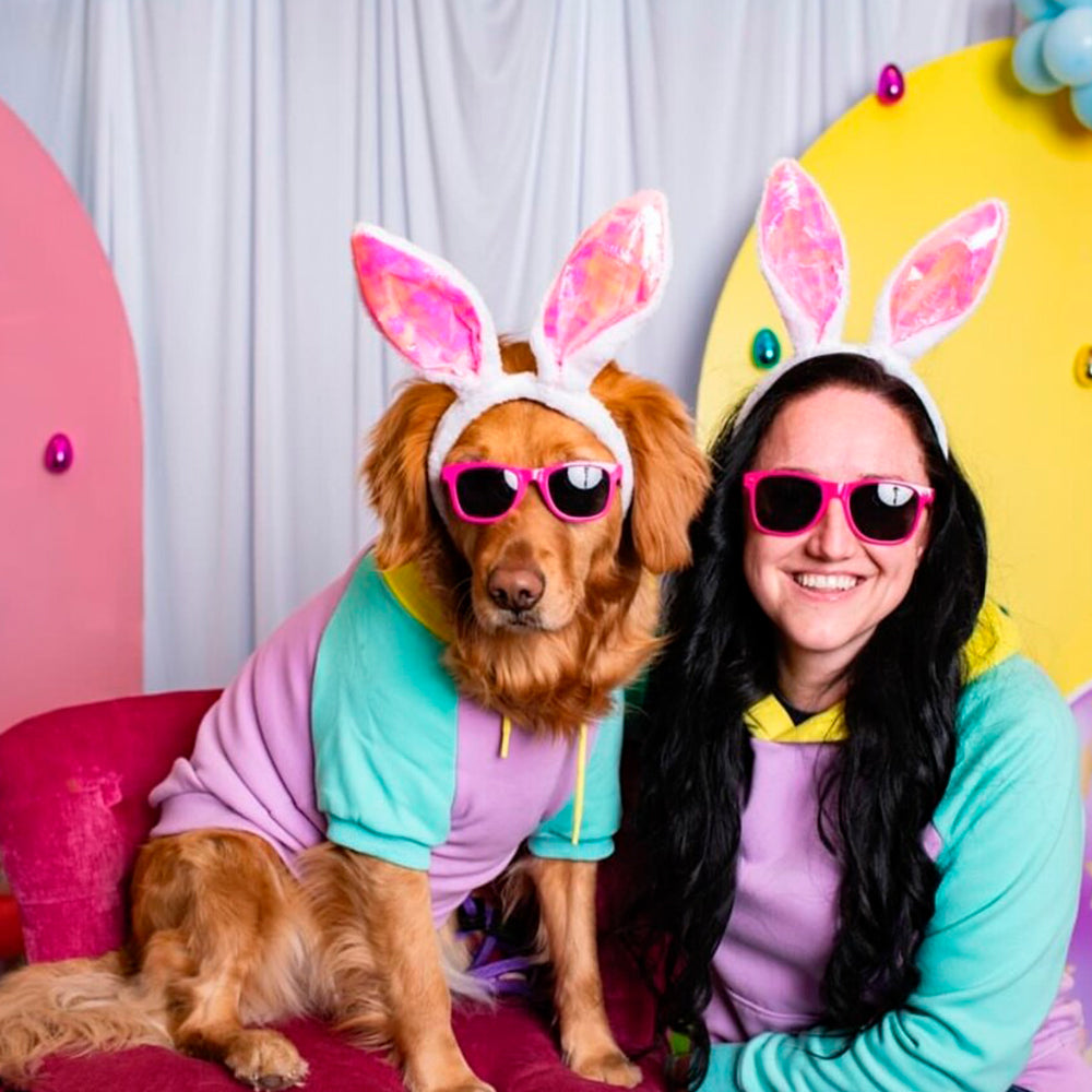 A dog and its owner wearing Sparkpaws Matching Apparel during dog's birthday