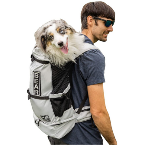 Man with his dog in his Dog backpack