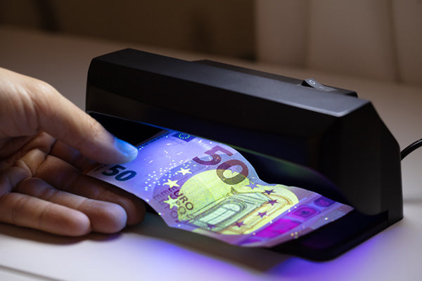 Detecting counterfeit money