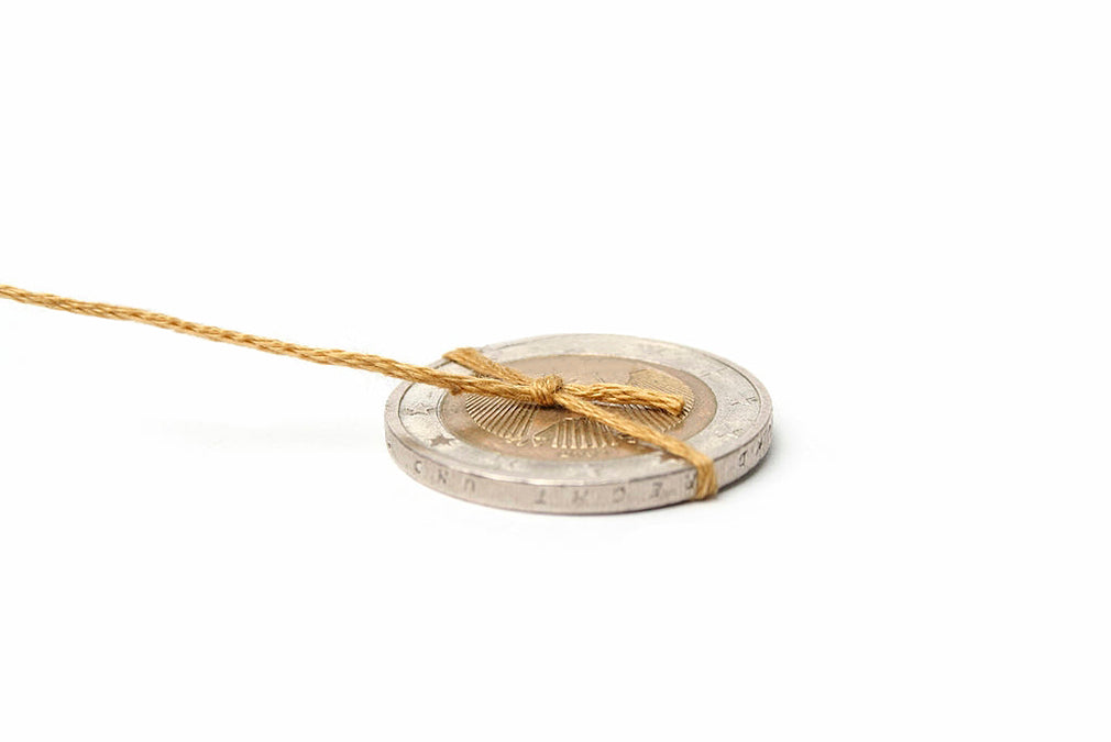 coin on string