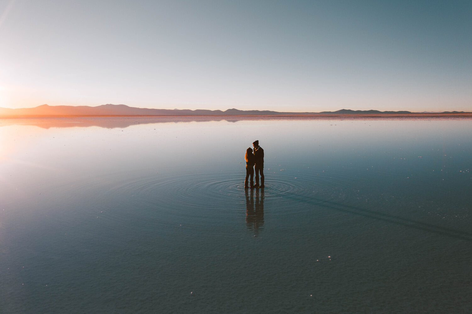 WhatTheChic and LostLeBlanc in the Salt Flats during sunrise, Uyuni, Bolivia