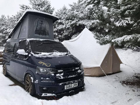 Glawning and VW camper covered in snow