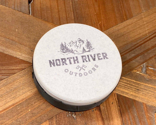 https://cdn.shopify.com/s/files/1/1641/2457/products/axe-sharpening-stone-240600-grit-usa-north-river-outdoors-2_512x410.jpg?v=1694648823