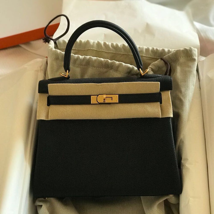 hermes kelly black gold