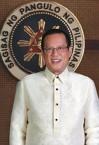Aquino in his presidential portrait wears his signature Barong Tagalog.