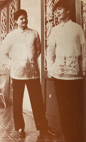 Gomez’ brother-in-law (right) stands with one of his groomsmen at his wedding. Both are in Gang Gomez designed piña barongs with all over calado