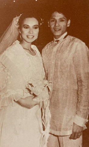 The groom wears a Katigbak-designed Barong Tagalog made of hand embroidered piña 