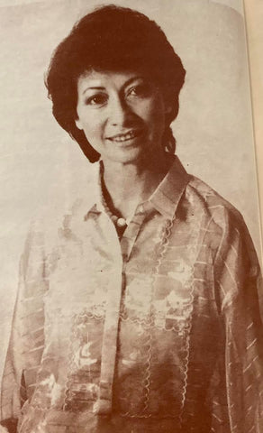 Airline executive Mila Abad wears a Barge Ramos Barong Tagalog with stripes and a bahay-kubo (nipa hut) scene in the embroidery