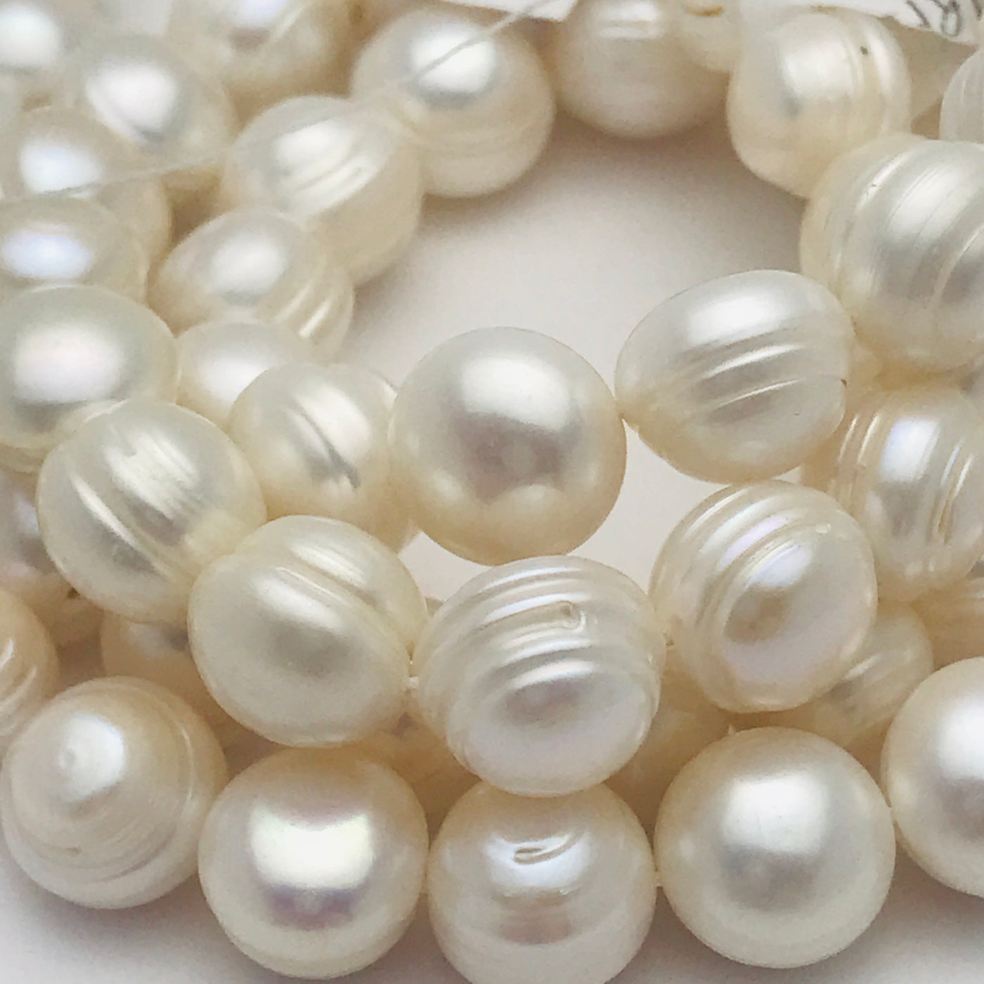 White Ridged Round Cultured Pearls 